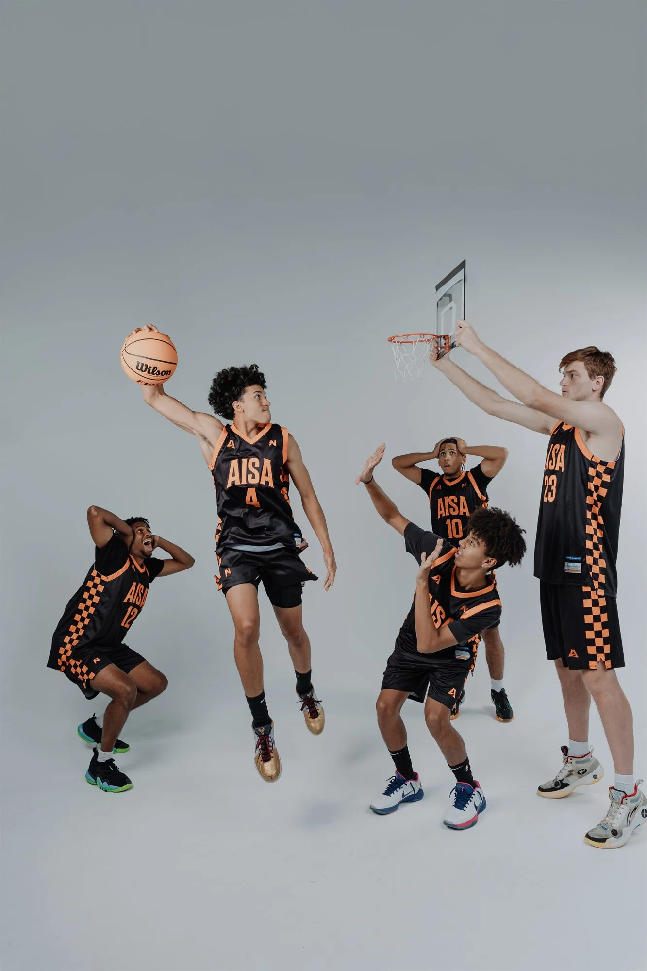 AISA athletes competing for a rebound